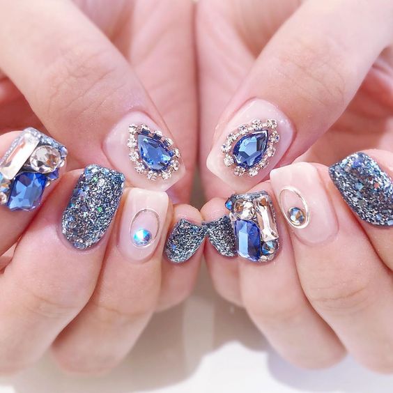 Blue_acrylic_gemstones_on_nails.jpg