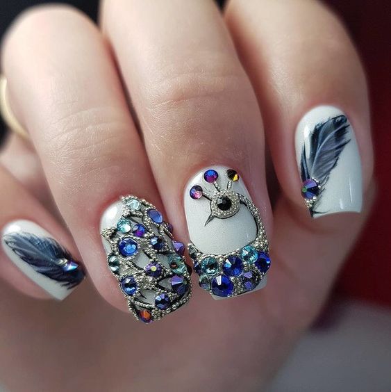 Peacock_acrylic_gems_on_nails.jpg